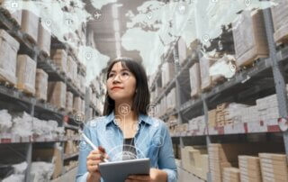 A woman checking an operations room global supply chain disruptions persist.