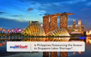 An image shows The Lion City at night with a caption saying Is Philippines Outsourcing the Answer to Singapore Labor Shortage.