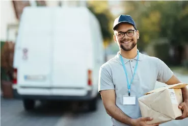 A Man Delivering a Box and a Van