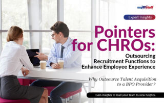 Two Chief Human Resources Officer are discussing inside a boardroom. Image caption reads: Recruitment Process Outsourcing: Pointers for CHROs.