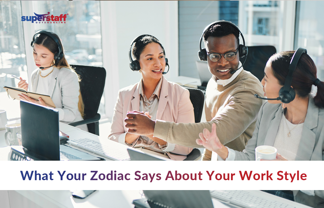 Four call center employees wearing headsets are working together in a bright, modern office. They are smiling and engaging with each other, suggesting a positive and collaborative atmosphere. The text says, "What Your Zodiac Says About Your Work Style," and the SuperStaff logo appears in the top left corner.