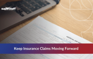Healthcare professional reviewing medical paperwork for outsourced claims management