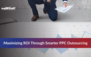 Business professionals discussing benefits of outsource PPC services for smarter ad results and cost-effective marketing strategies.