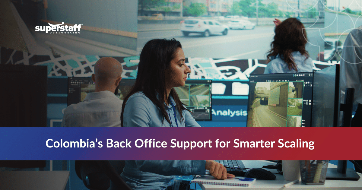 Back office workers in Colombia collaborating to support startups through outsourcing services.