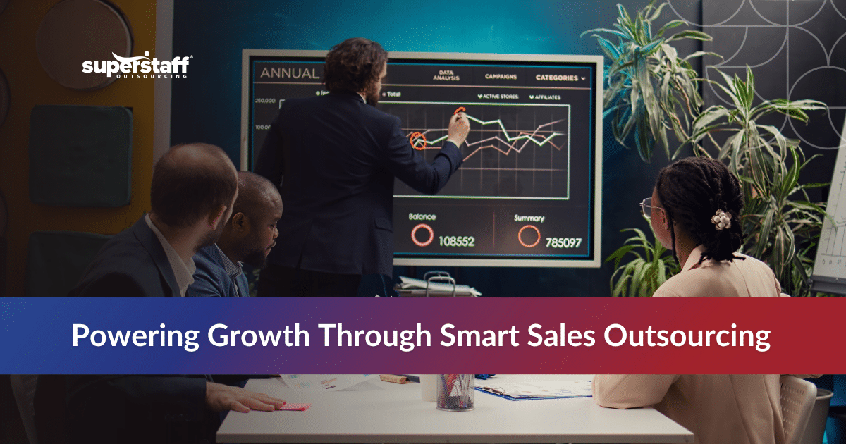 Sales team collaborating to understand different sales outsourcing types