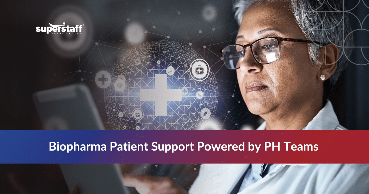 A medical professional reviewing data on a tablet, optimizing biopharma patient support services.