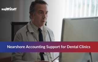 Dental clinic team reviewing outsource dental accounting services reports