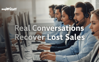 A row of support agents typing on computers with headsets, offering live chat outsourcing dedicated to recovery.