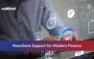 Professional using a laptop with digital financial icons for financial services call center outsourcing.