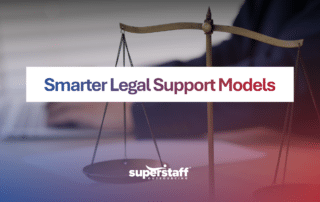 Legal professional with Lady Justice and books at a litigation process outsourcing company.