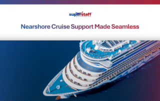 A cruise ship sailing on vibrant blue waters, showcasing reliable and streamlined cruise support services.