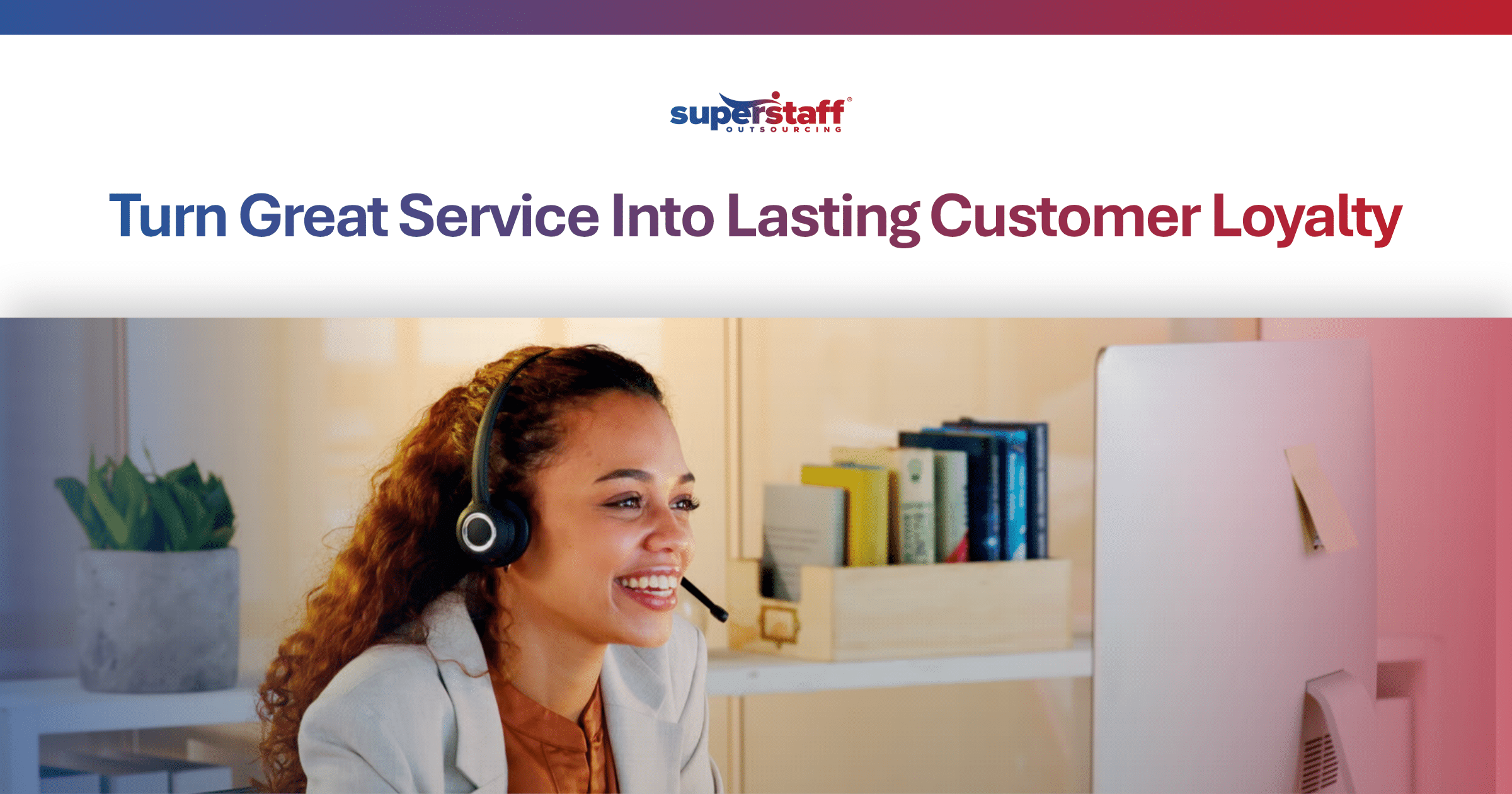 Smiling support agent with headset at a computer, representing a focus on customer loyalty and retention.