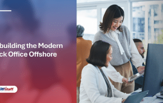 Two office professionals collaborating at a desk, illustrating effective business operations outsourcing.